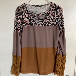 Noracora women’s multi-colored shirt size large.